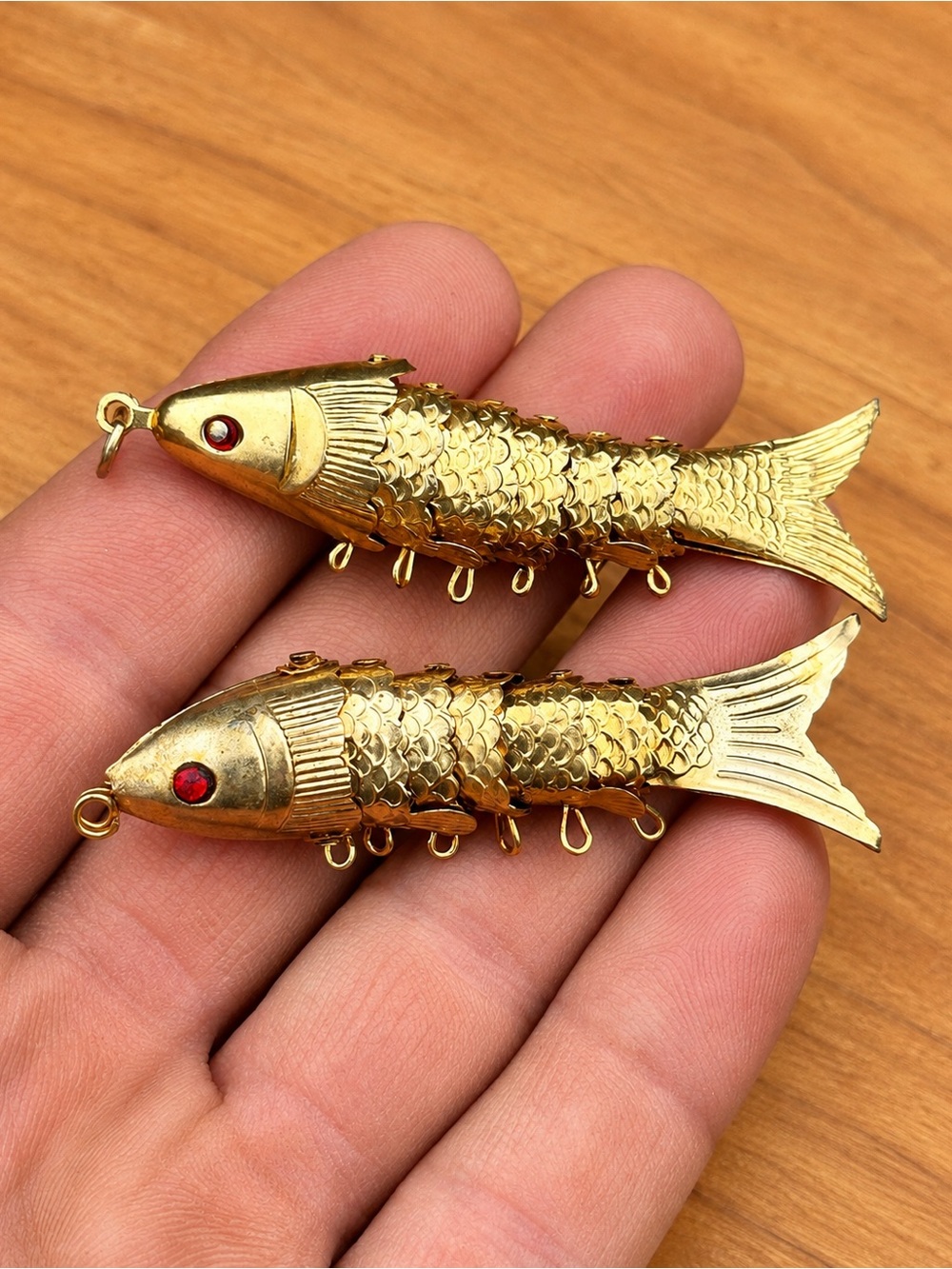 Vintage Pair Articulated Brass Fish Charms Red Glass Eyes Gold Tone Pendants